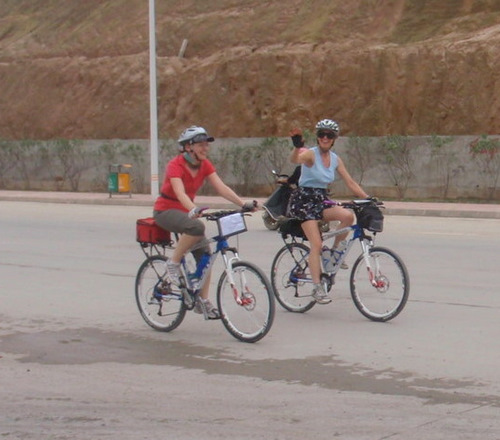 Sharon and Terry passing by Dennis.